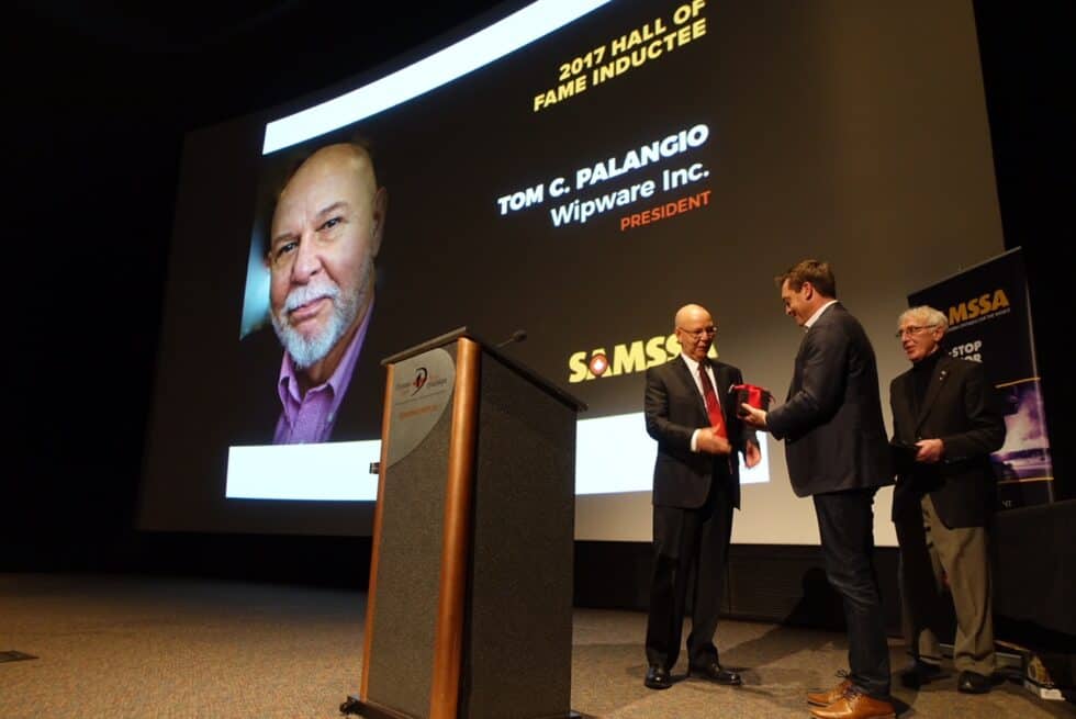 Tom receiving Hall of Fame Award from SAMSSA representatives