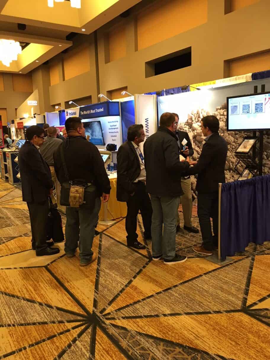 ISEE Attendees learning about fragmentation analysis at WipWare booth