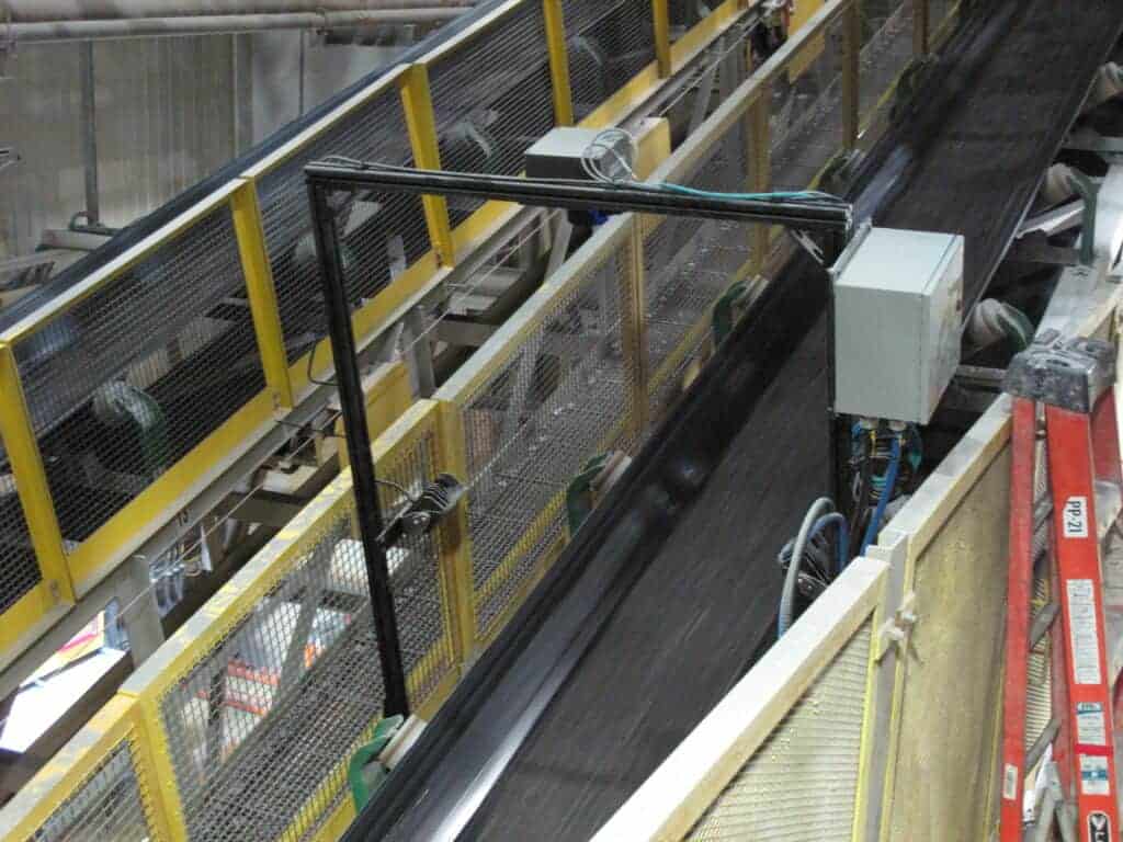Image of WipWare Solo system over a conveyor belt