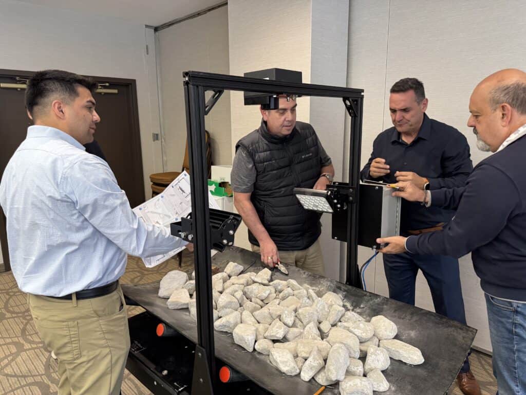 WipCon 2025 international reseller conference attendees in Montréal installing and configuring a WipWare Solo system
